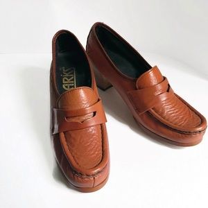 Vintage leather penny loafer with a stacked heel.